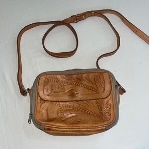 Tooled leather cross body purse